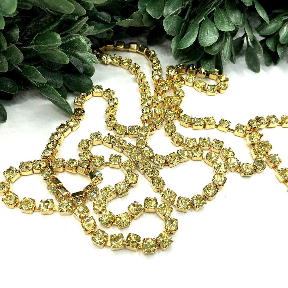 Gold-Tone Long Crystal Necklace With Adjustable Length and Branded Tag